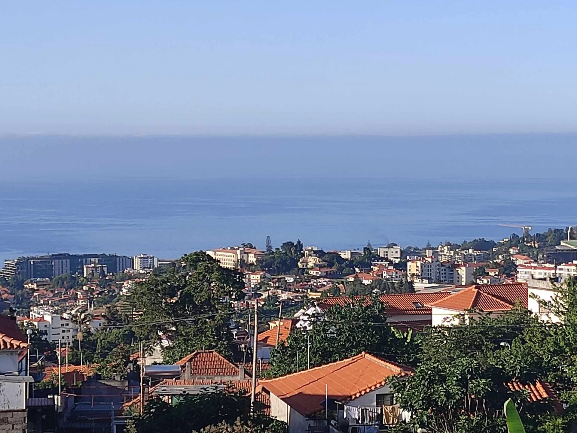 Building land with ruin and view of the ocean and Funchal