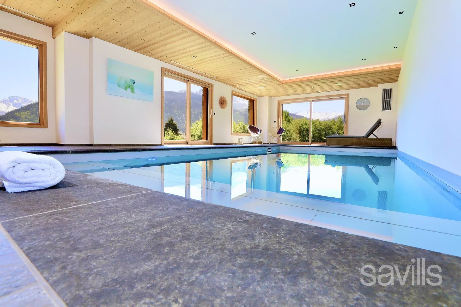 Newly built luxury chalet of 483 sq m with swimming pool and south facing terrace.