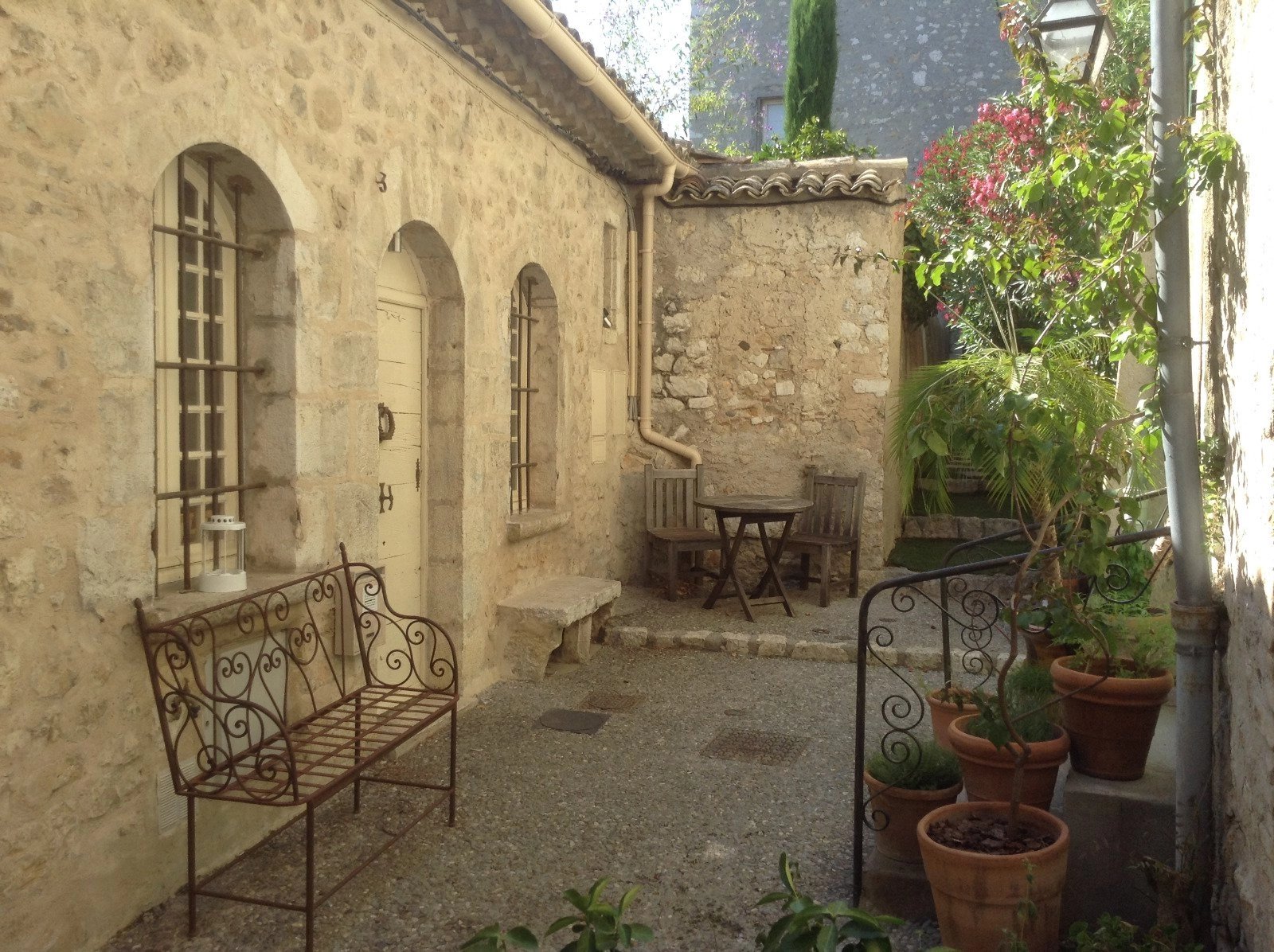 In the village, stone built house on two levels, part residential / part gallery. Exclusivity.