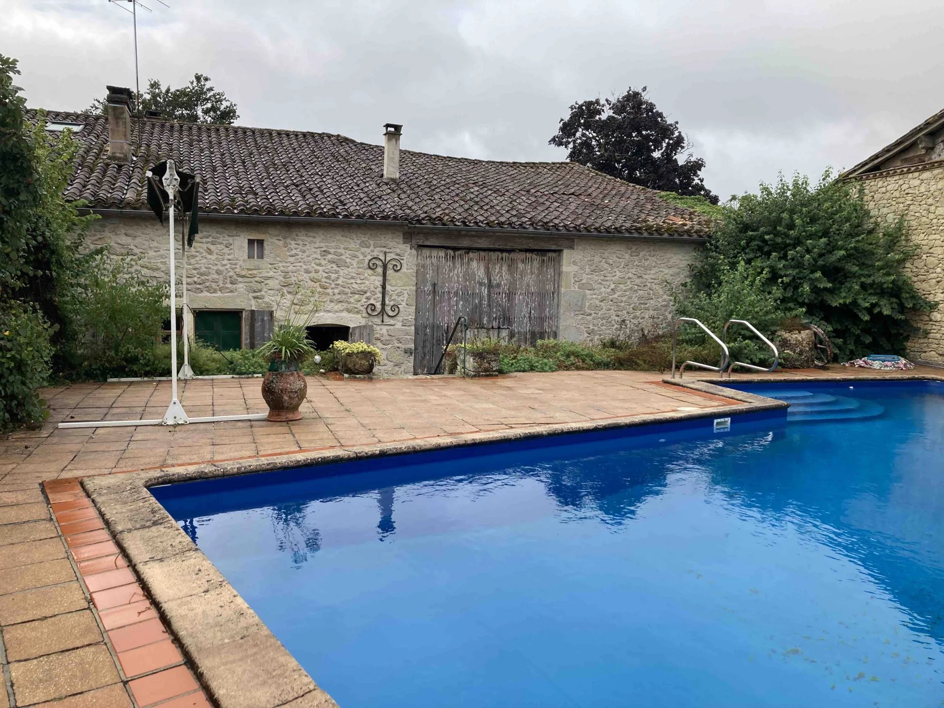 Character filled house, with good views, barn and pool