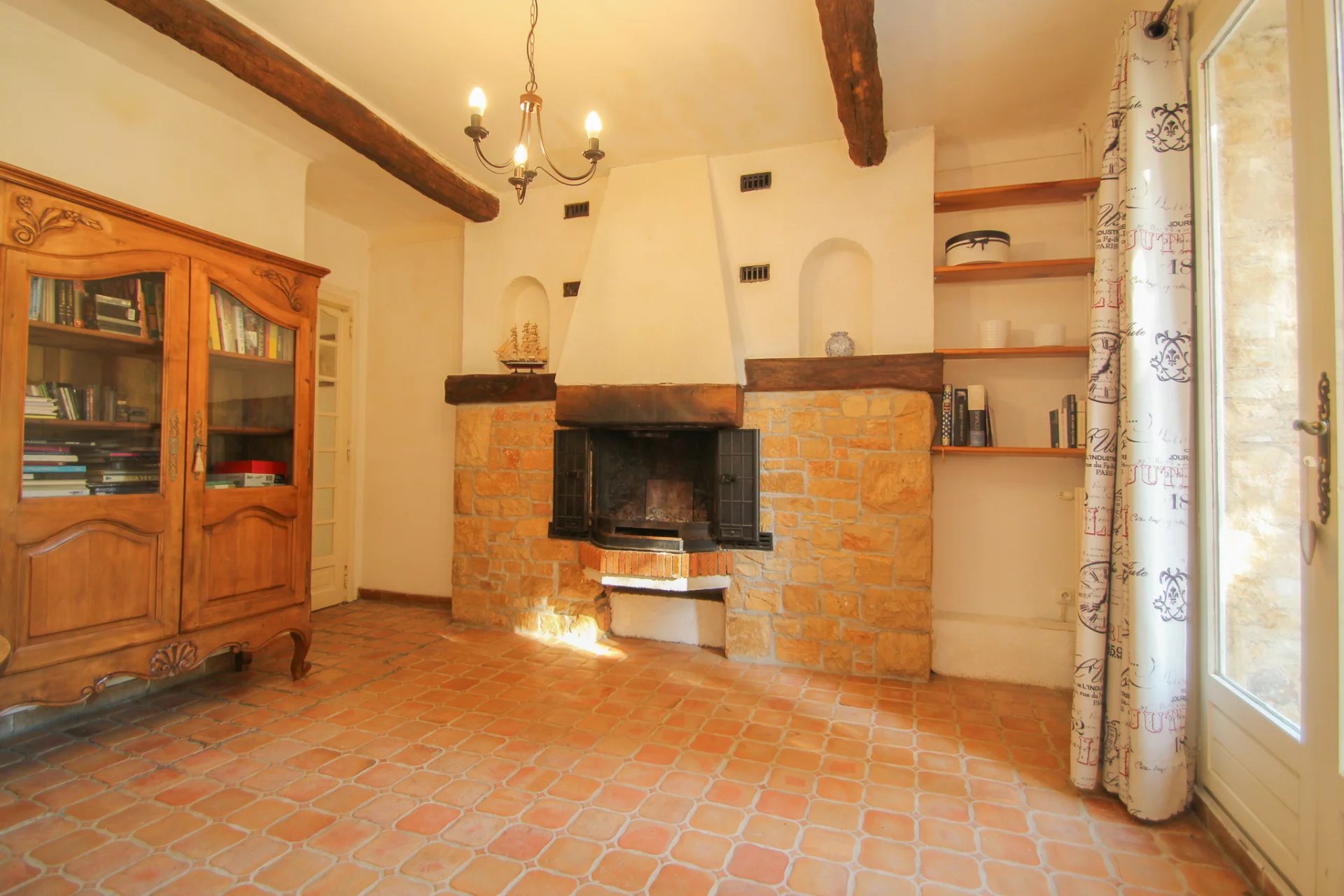 Stone farmhouse with outbuildings in a peaceful location.